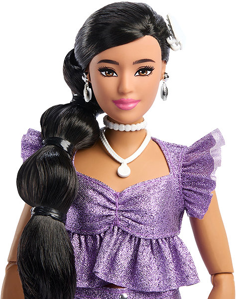 Barbie doll deluxe model with purple shorts.