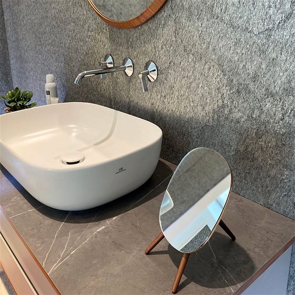Spirella Alesia oval cosmetic mirror with three acacia wood legs.