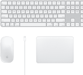 View of a desk with a Magic Mouse, USB-C cable, Magic Trackpad and Magic Keyboard with numeric keypad