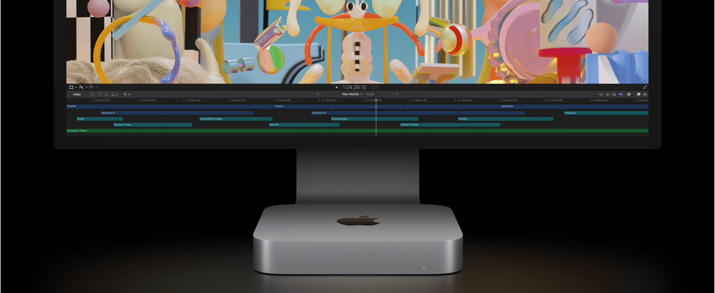 Pohľad spredu na Mac mini a Studio Display so zobrazeným videoprojektom vo Final Cutu Pro.